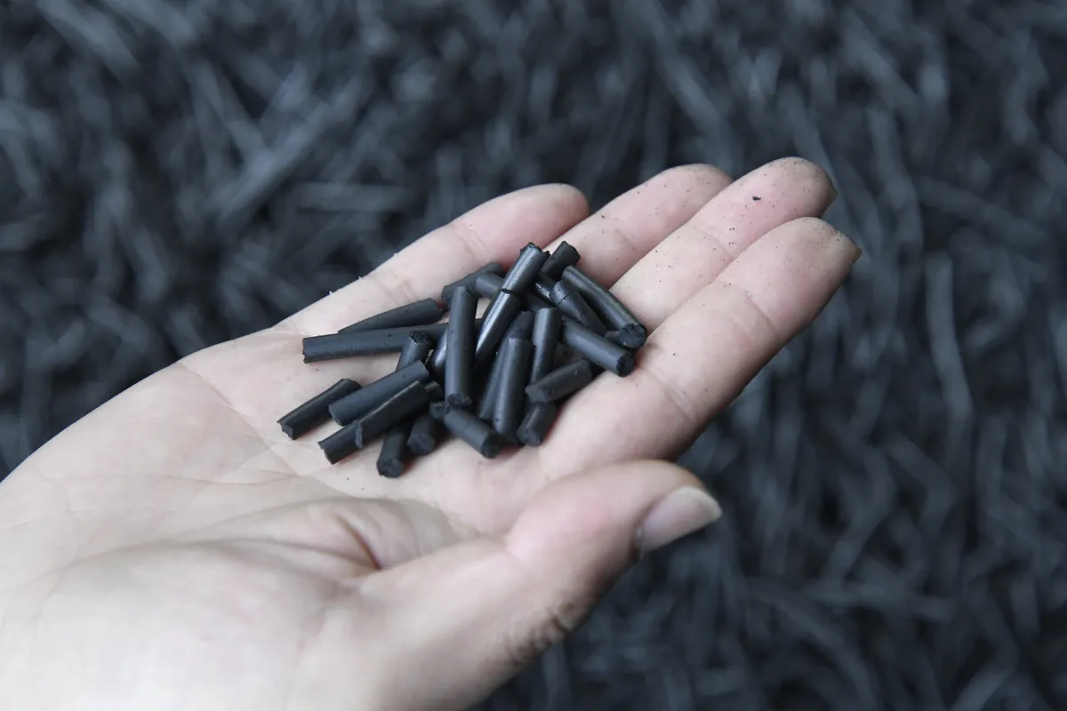 Pelletized activated carbon sampled for quality review